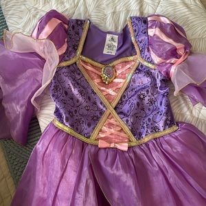 Disney park’s  Rapunzel Dress size 7/8
